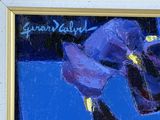 painting of a purple flower in a gold frame on a blue background