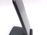 a close up of a cell phone on a stand