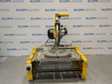 a machine that is sitting on a table in front of a wall