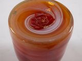 a picture of a glass vase with a swirl in it