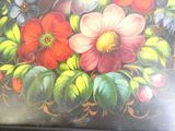 a picture of a painting of flowers on a table