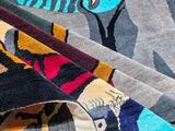three different colored rugs with zebras and zebras on them