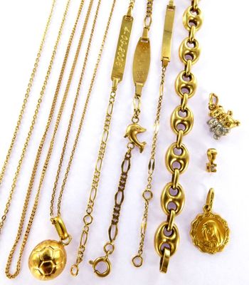 several different types of gold necklaces and bracelets on a white surface