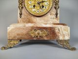 a clock that is sitting on top of a table