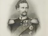 an old black and white photo of a man in uniform