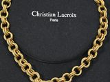 a gold chain bracelet with a star charm on it