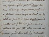 a close up of a piece of paper with writing on it