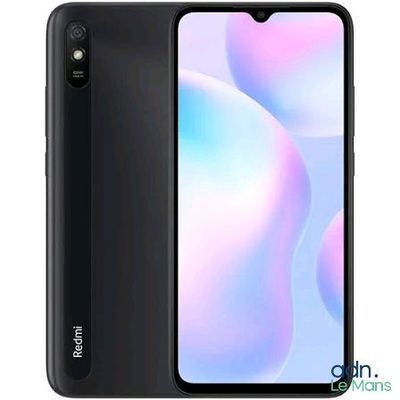 the back of a black xiao redmik phone with a white background