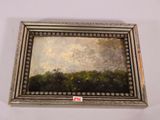 an oil painting of a landscape with trees in a silver frame