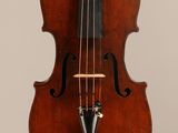 un vieux violon dont l'archet pend du manche