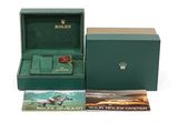 an image of a rolex watch in a green box