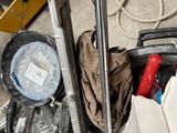 an image of a suitcase full of stuff on the floor