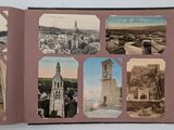 an open book with pictures of buildings and a clock tower
