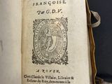 an open book with a picture of a woman on it