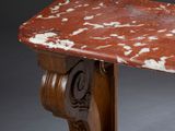 a marble top table with a wooden base on a gray background
