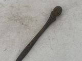 a small knife that is laying in the snow