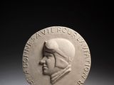 une image d'une pièce de monnaie sur laquelle figure le visage d'un homme