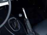 a car dashboard with a steering wheel and some gear in it