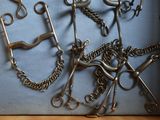 a lot of different types of scissors in a box