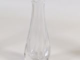 pair of clear glass vases sitting on a white surface
