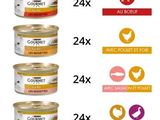 une image représentant quatre boîtes de nourriture pour chat sur fond blanc