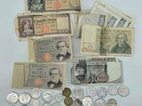 many different types of money and coins on the table