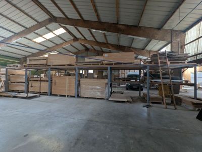 a large warehouse filled with lots of boxes and pallets