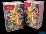 On voit deux boîtes de cartes à collectionner Pokémon sur un fond noir.