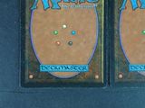 two decks of magic the gathering cards on the table