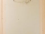 an old picture of a painting hanging on a wall in a room