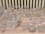 a lot of empty wine glasses on the table