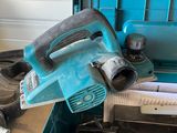 a blue tool box with tools inside of it