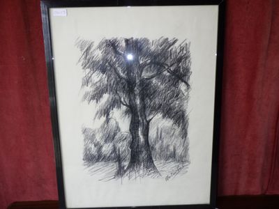drawing of a tree in a black frame on a red curtain