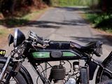 a motorcycle that is parked on the side of the road
