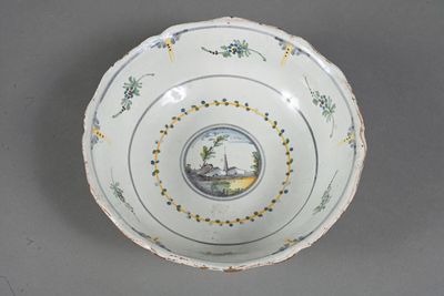 a white bowl with a picture of a boat on it