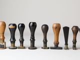 several different types of woodworking tools are lined up on a white surface