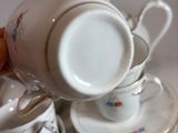 a stack of cups and saucers on a table