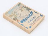 an old book with a picture of a woman on it