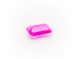 a pink diamond on a white background