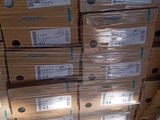many boxes stacked on top of each other on the floor