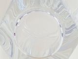 a clear glass plate with a design on it