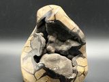 a small rock that is sitting on a table