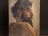 une peinture à l'huile représentant un homme barbu, réalisée sur un support en bois