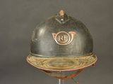 a helmet that is sitting on a stand on a table