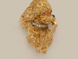 an image of a gold and diamond dog broochle
