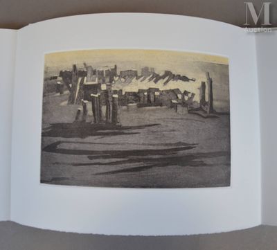 une photo d'un livre sur laquelle figure une image d'une ville