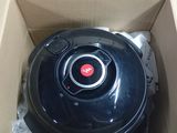 a box with a vacuum cleaner inside of it