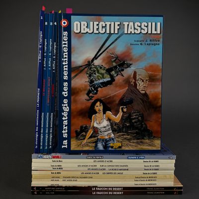a stack of books with a picture of a woman and a helicopter