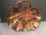 a decorative plate on display on a table