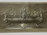 an old picture of a silver vase with flowers and birds on it